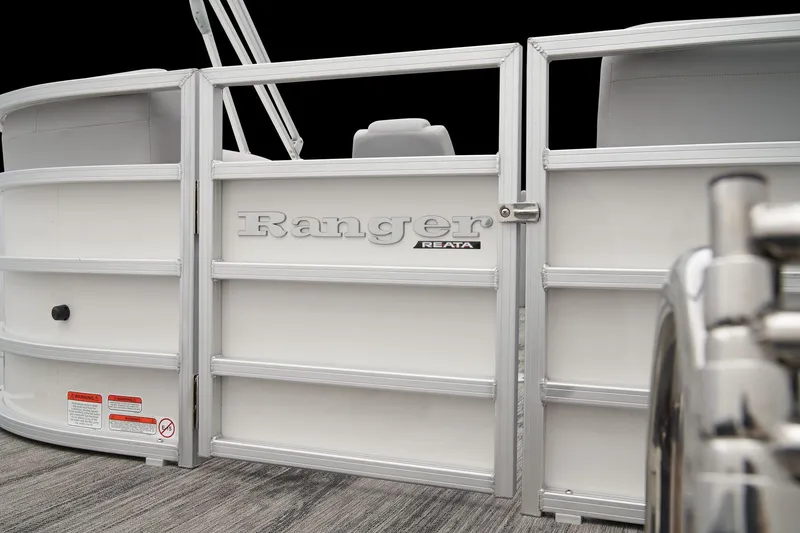 Slide: The Image of Luxurious seating on 2025 Ranger Reata 243C boat, featuring elegant quilted upholstery. - 30
