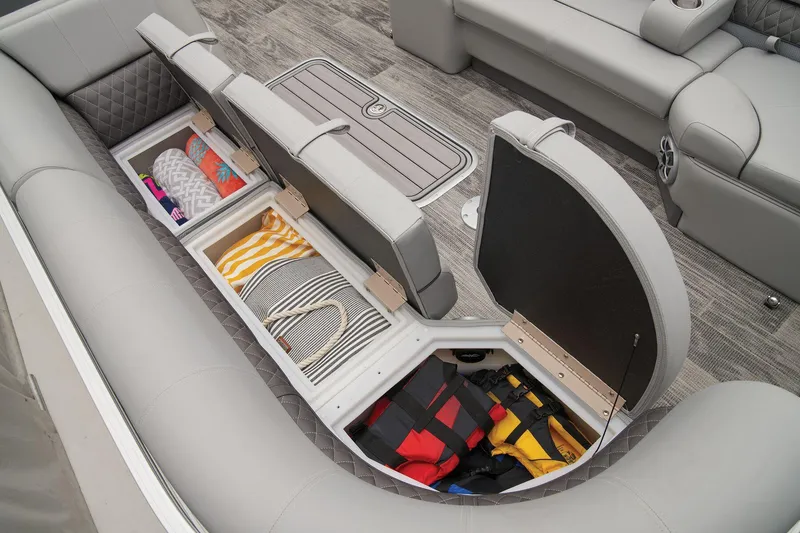 Slide: The Image of Luxurious seating on 2025 Ranger Reata 243C pontoon boat with cup holders and speaker. - 50