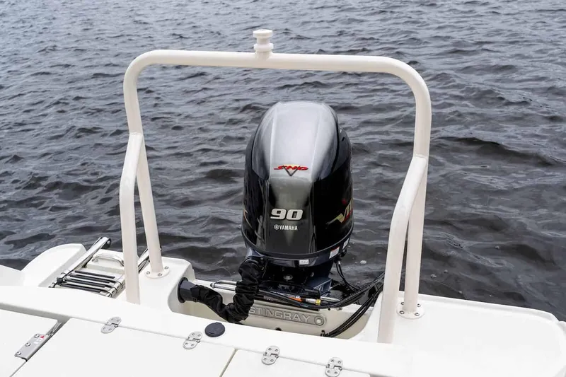 Slide: The Image of Manufacturer Provided Image: 2025 Stingray 173 CC boat with Yamaha 90 outboard motor on water. - 10