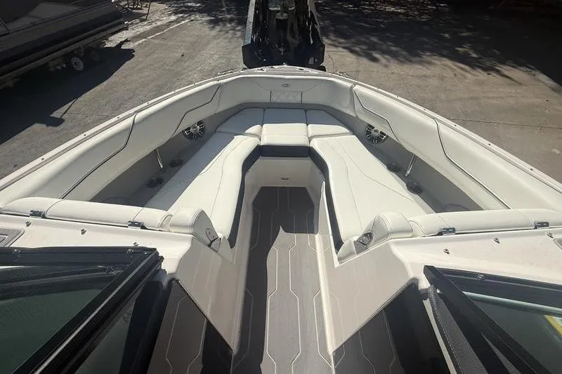 Slide: The Image of 2023 Regal LS4 Surf boat interior with spacious seating and modern design. - 19