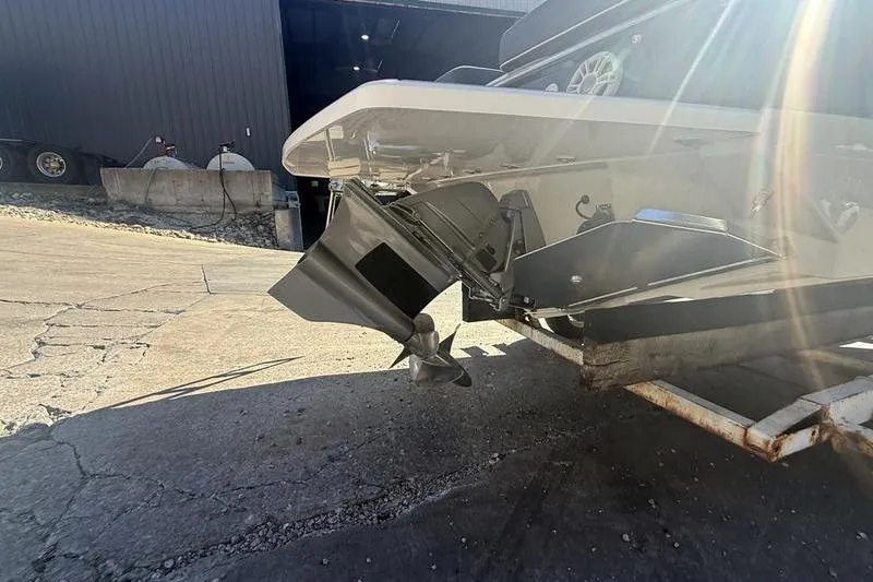 Slide: The Image of 2023 Regal LS4 Surf boat propeller and stern in sunlight. - 21