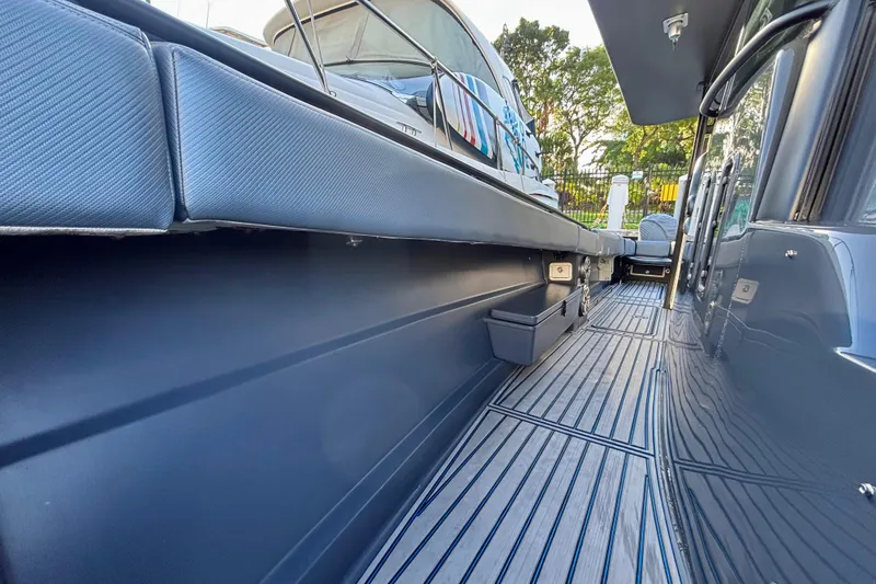 Slide: The Image of 2016 Hydra-Sports 4200 Siesta boat deck with sleek design and modern features. - 16