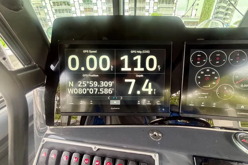 Slide: The Image of Dashboard of 2016 Hydra-Sports 4200 Siesta showing GPS speed, heading, and depth. - 20