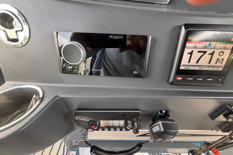 Slide: The Image of Control panel of 2016 Hydra-Sports 4200 Siesta with navigation and communication devices. - 25