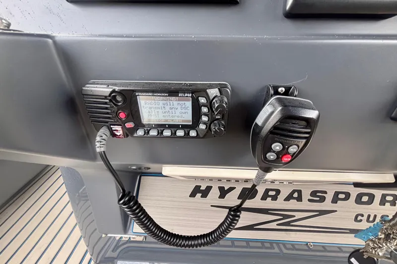 Slide: The Image of Control panel of 2016 Hydra-Sports 4200 Siesta with radio and microphone. - 27