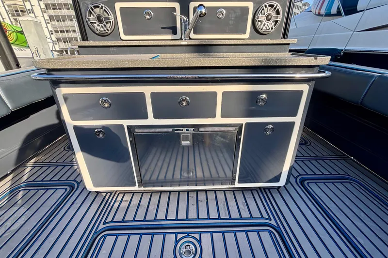 Slide: The Image of 2016 Hydra-Sports 4200 Siesta boat interior with sleek cabinetry and modern design. - 46