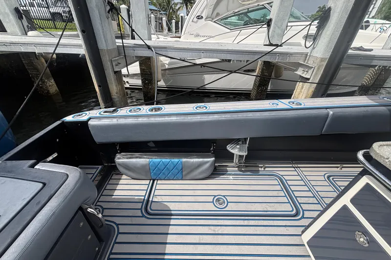 Slide: The Image of 2016 Hydra-Sports 4200 Siesta boat interior with sleek seating and modern design elements. - 56