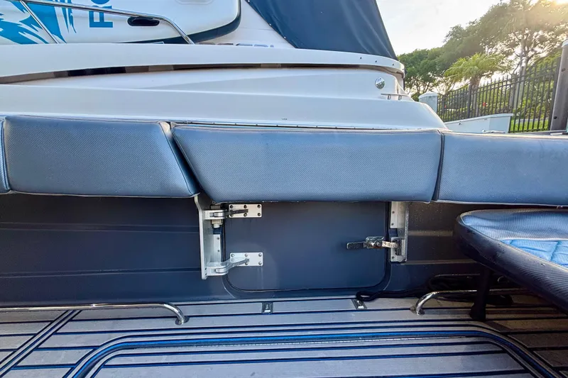 Slide: The Image of 2016 Hydra-Sports 4200 Siesta boat interior with cushioned seating and sleek design. - 59