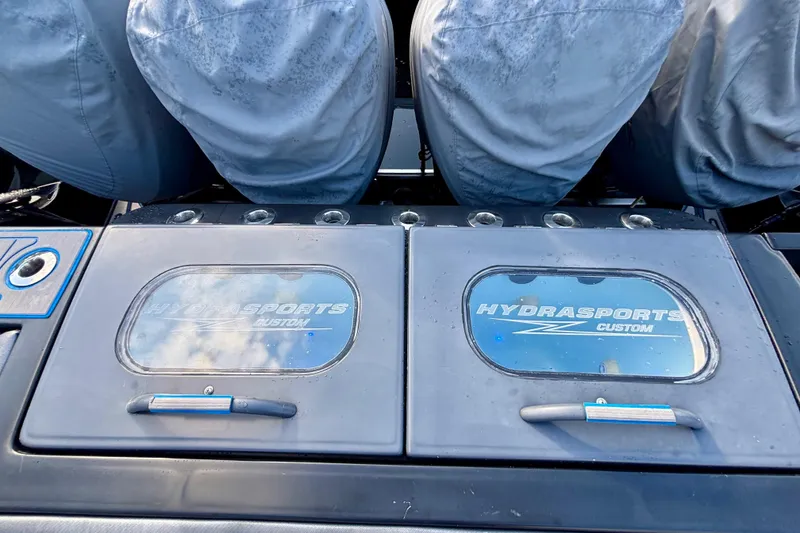 Slide: The Image of 2016 Hydra-Sports 4200 Siesta boat console with custom branding and covered seats. - 60