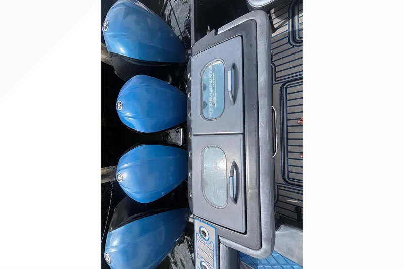 Slide: The Image of 2016 Hydra-Sports 4200 Siesta boat with blue outboard engines and storage compartments. - 61