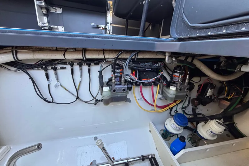 Slide: The Image of 2016 Hydra-Sports 4200 Siesta engine compartment with wiring and components. - 72