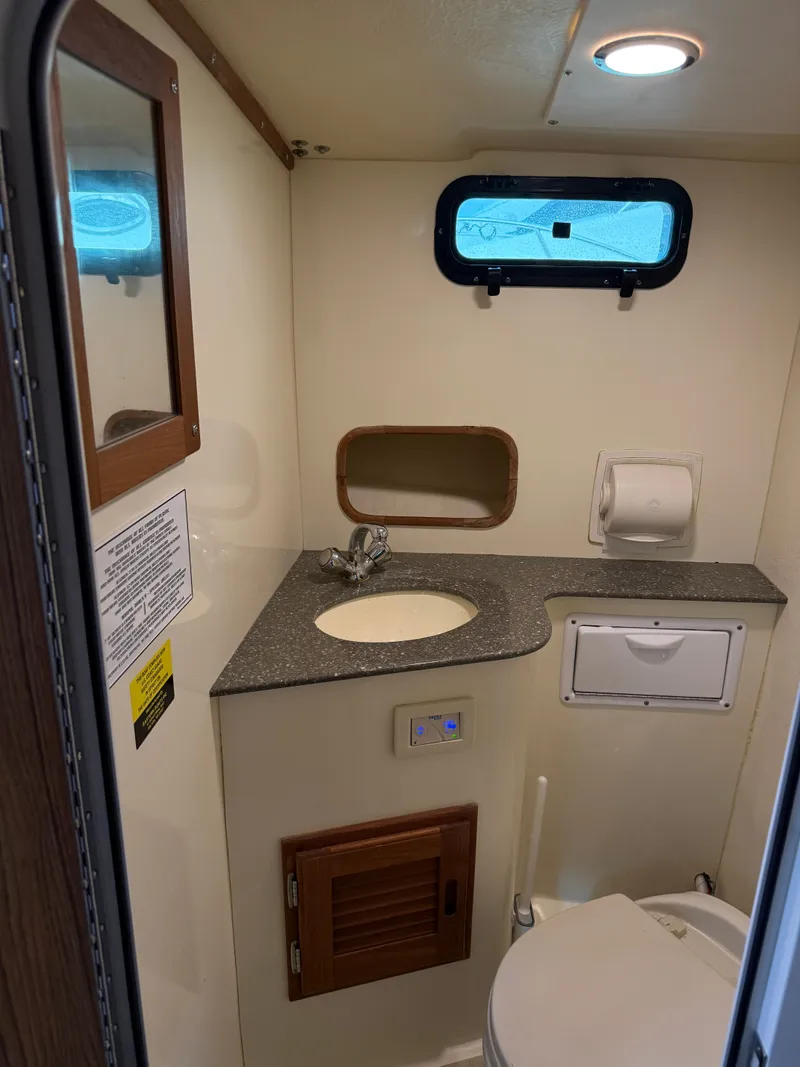 Slide: The Image of Interior view of bathroom on a 2018 Eastern 27 Islander Hardback boat. - 27