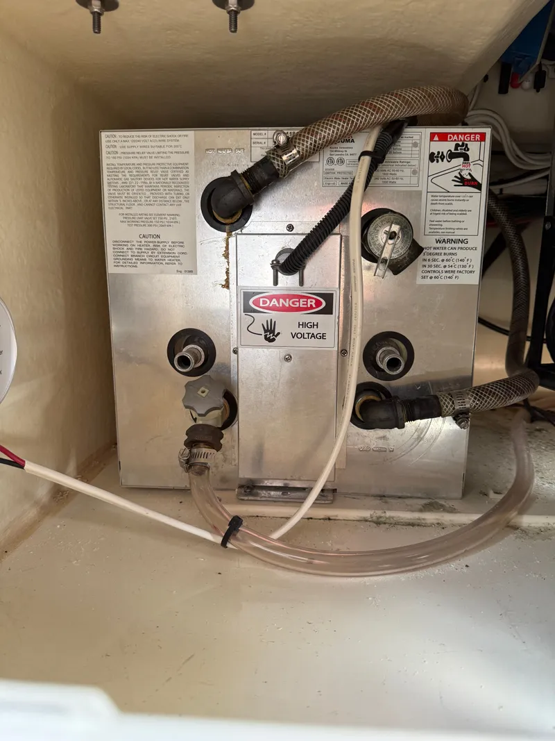 Slide: The Image of High voltage unit in Eastern 27 Islander Hardback boat, year 2018. - 43