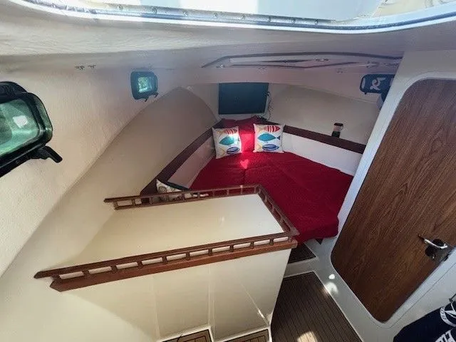 Slide: The Image of Interior of 2018 Eastern 27 Islander Hardback with cozy bed. - 7