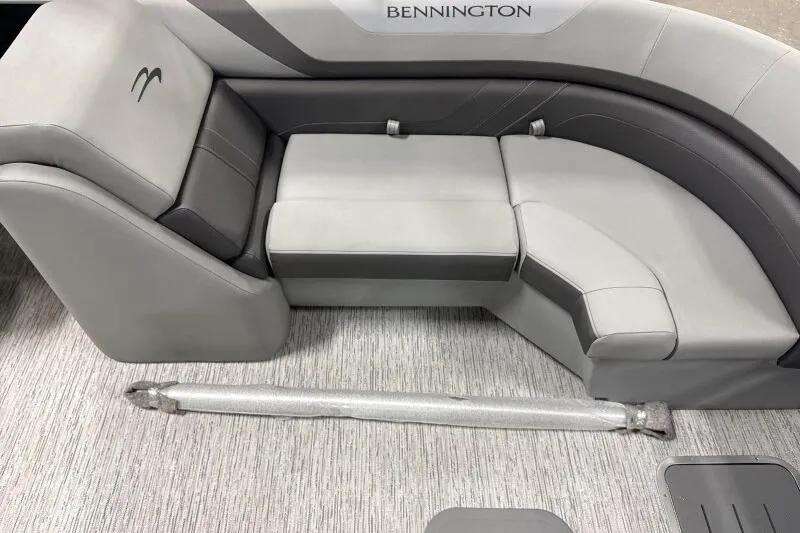 Slide: The Image of 2026 Bennington 24SXSR boat interior with gray seating and flooring. - 5