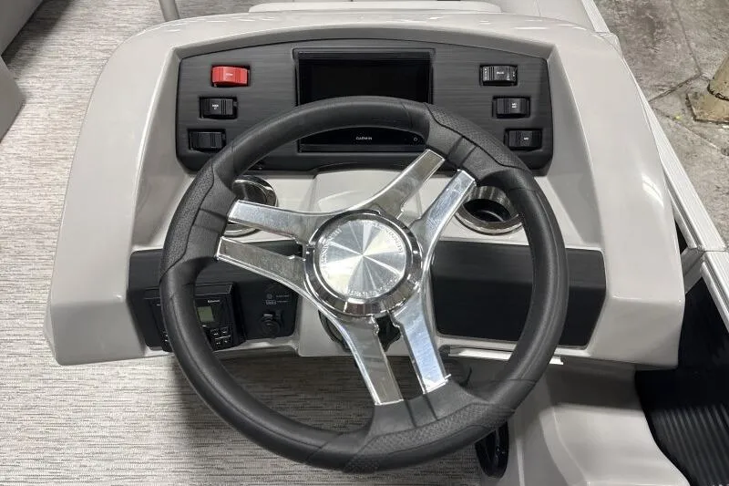 Slide: The Image of Steering wheel of 2026 Bennington 24SXSR with dashboard. - 6