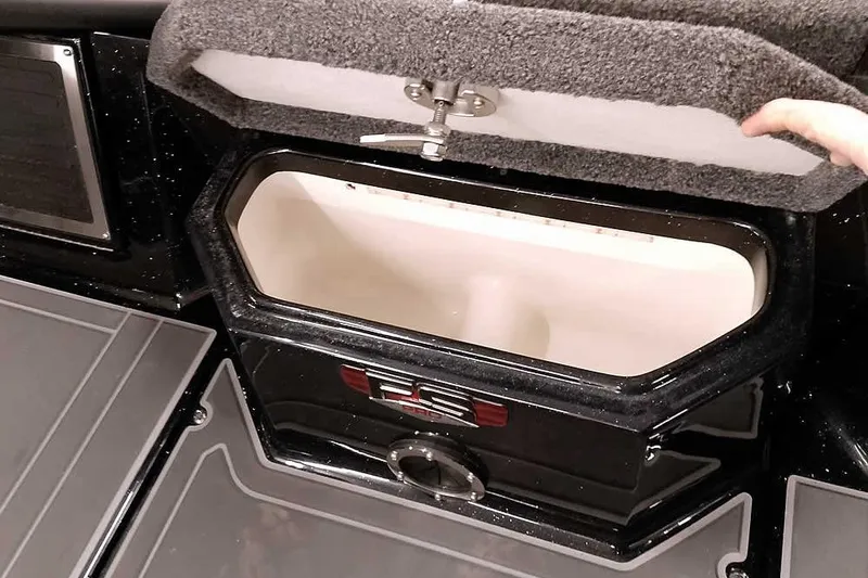 Slide: The Image of Open storage compartment in 2026 Ranger 620xFS Pro boat. - 13