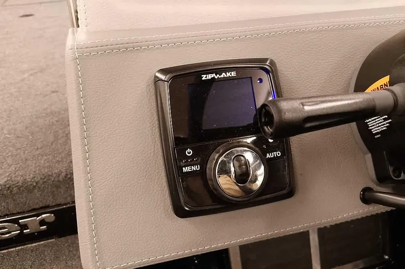 Slide: The Image of 2026 Ranger 620xFS Pro boat dashboard with Zipwake control panel. - 29