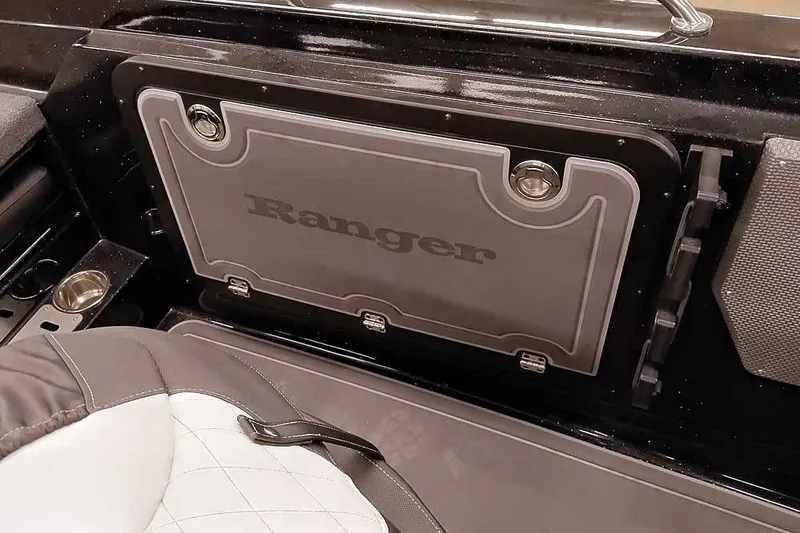 Slide: The Image of 2026 Ranger 620xFS Pro boat interior with storage compartment and seating. - 34