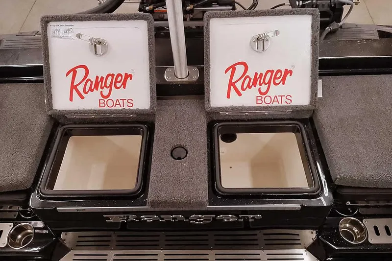 Slide: The Image of 2026 Ranger 620xFS Pro boat storage compartments with open lids displaying "Ranger Boats" logo. - 41