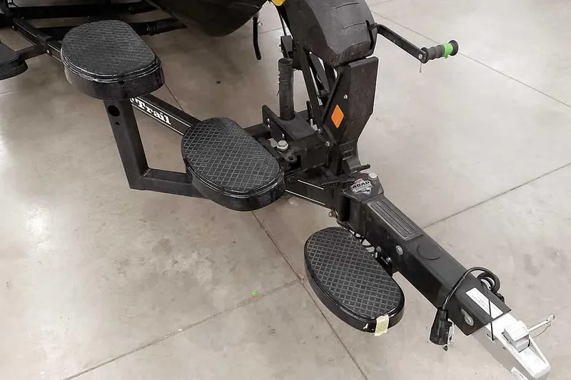 Slide: The Image of Trailer hitch and steps of 2026 Ranger 620xFS Pro on concrete floor. - 5