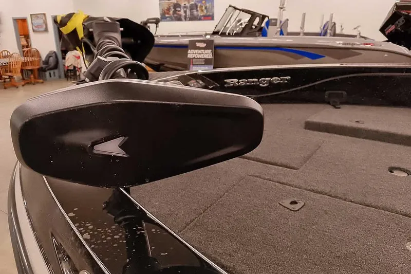 Slide: The Image of 2026 Ranger 620xFS Pro boat with advanced trolling motor in showroom. - 8