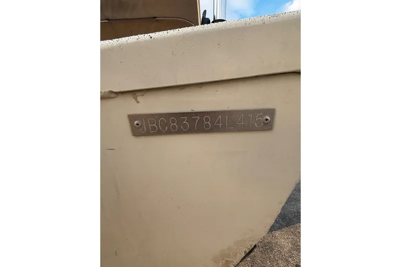 Slide: The Image of 2015 Express XP20CC boat with visible hull identification number. - 24