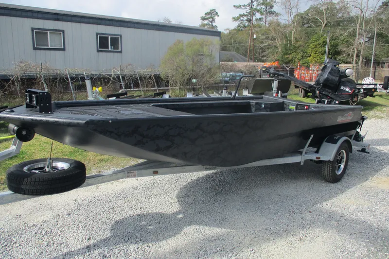 The Image of 2026 Gator Tail 1854 Extreme boat on trailer, parked outdoors. - 0