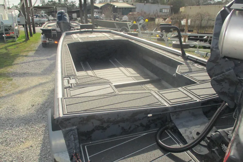 Slide: The Image of 2026 Gator Tail 1854 Extreme boat on trailer, showcasing spacious interior design. - 6