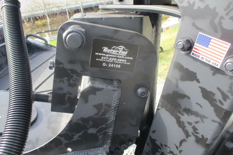 Slide: The Image of 2026 Gator Tail 1854 Extreme boat detail with USA flag sticker. - 9