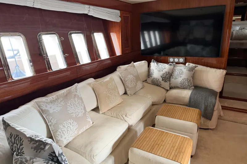 Slide: The Image of Luxurious interior of 2004 Mangusta 72 yacht with plush seating and elegant decor. - 26