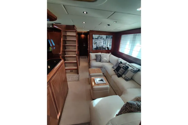 Slide: The Image of Luxurious interior of 2004 Mangusta 72 yacht with plush seating and elegant decor. - 45
