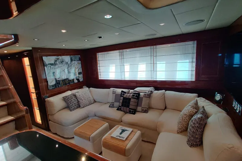 Slide: The Image of Luxurious interior of 2004 Mangusta 72 yacht with plush seating and elegant decor. - 46