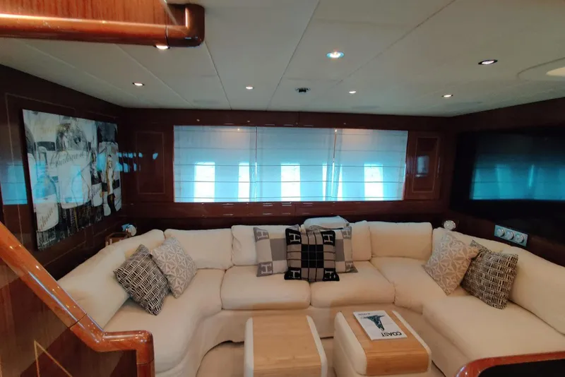 Slide: The Image of Luxurious interior of 2004 Mangusta 72 yacht with plush seating and elegant decor. - 47