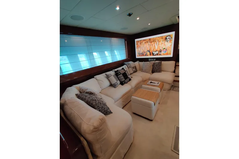 Slide: The Image of Luxurious interior of 2004 Mangusta 72 yacht with plush seating and modern decor. - 58