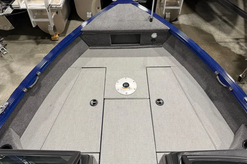 Slide: The Image of 2025 G3 Angler V178 F boat interior with gray deck and blue trim. - 2