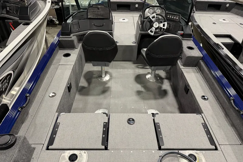 Slide: The Image of 2025 G3 Angler V178 F boat interior with dual seats and steering console. - 4