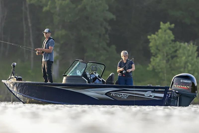 Slide: The Image of Manufacturer Provided Image: Two people fishing on a 2025 G3 Angler V178 F boat in a serene lake. - 5