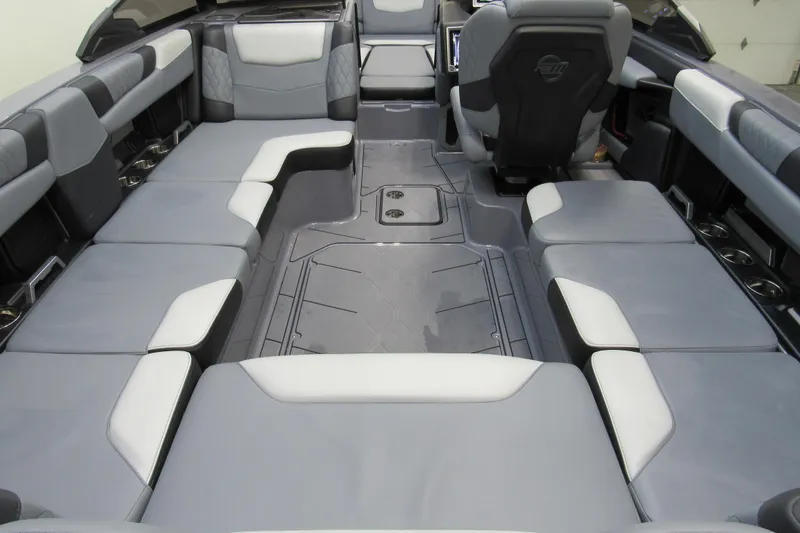 Slide: The Image of 2024 Malibu M220 boat interior with spacious seating and modern design. - 3
