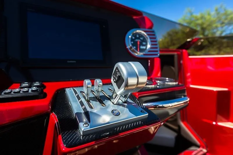 Slide: The Image of 2026 Nor-Tech 360 Monte Carlo Flyer cockpit with sleek red controls and modern dashboard. - 3