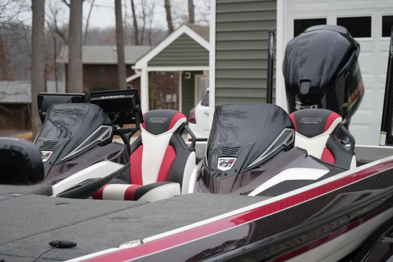 Slide: The Image of 2021 Skeeter FXR21 Apex boat with sleek design and advanced Garmin technology. - 12