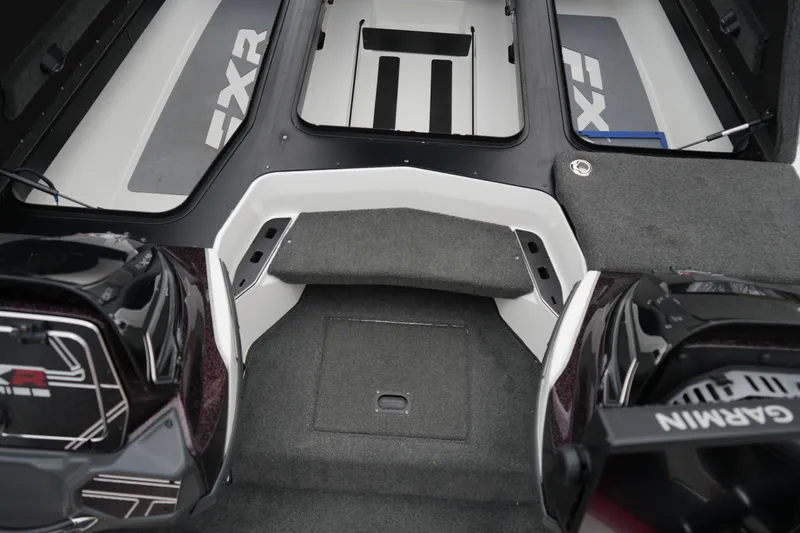 Slide: The Image of 2021 Skeeter FXR21 Apex boat interior with Garmin equipment and FXR branding. - 15