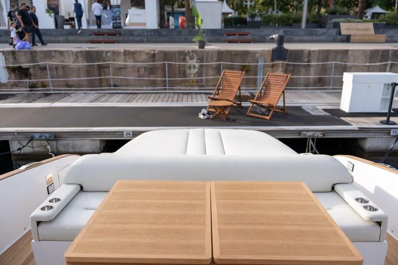 Slide: The Image of 2026 Solaris Power 44 Sport Turismo yacht interior with dockside view. - 13