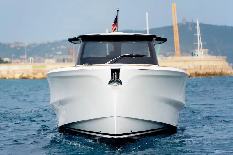Slide: The Image of 2026 Solaris Power 44 Sport Turismo yacht on open water, front view. - 2