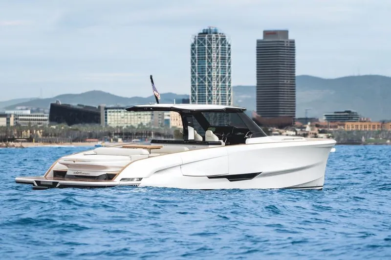 Slide: The Image of 2026 Solaris Power 44 Sport Turismo yacht cruising near city skyline. - 3