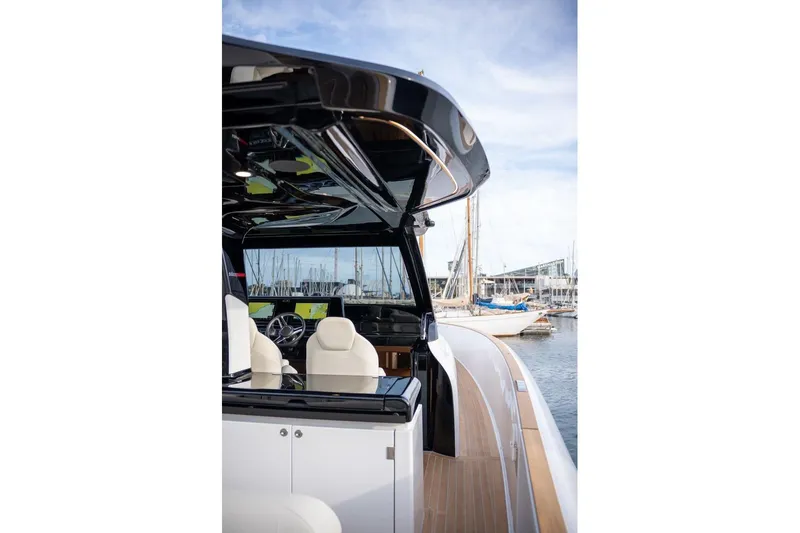 Slide: The Image of 2026 Solaris Power 44 Sport Turismo yacht interior with sleek design and modern controls. - 9