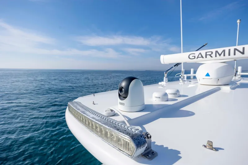 Slide: The Image of 2022 Regulator 31 boat with Garmin equipment on open sea. - 29