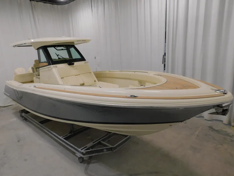 Slide: The Image of Luxury seating on 2023 Chris-Craft Catalina 30 boat, featuring elegant white upholstery. - 11