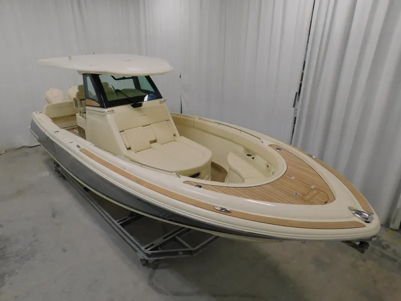 Slide: The Image of 2023 Chris-Craft Catalina 30 interior with storage compartments and control panel. - 12