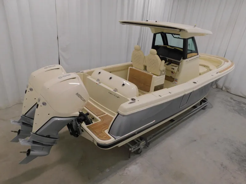 Slide: The Image of 2023 Chris-Craft Catalina 30 cabin interior with bed and sink. - 13